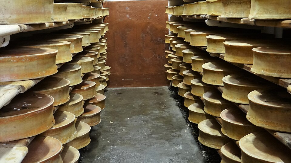 "Wheels of Beaufort cheese.jpg" by Ibex73, CC BY-SA 4.0, via Wikimedia Commons Wheels of Beaufort cheese.jpg — "Wheels of Beaufort cheese.jpg" by Ibex73, CC BY-SA 4.0, via Wikimedia Commons