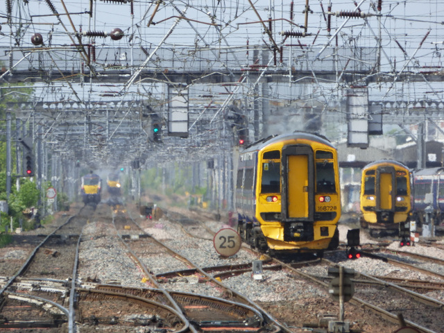 Trains through a heat haze (geograph 4985591).jpg