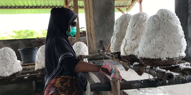 Banner image: A salt producer drains harvested salt in Lombok, Indonesia. Image courtesy of the Millenium Challenge Corporation (public domain).