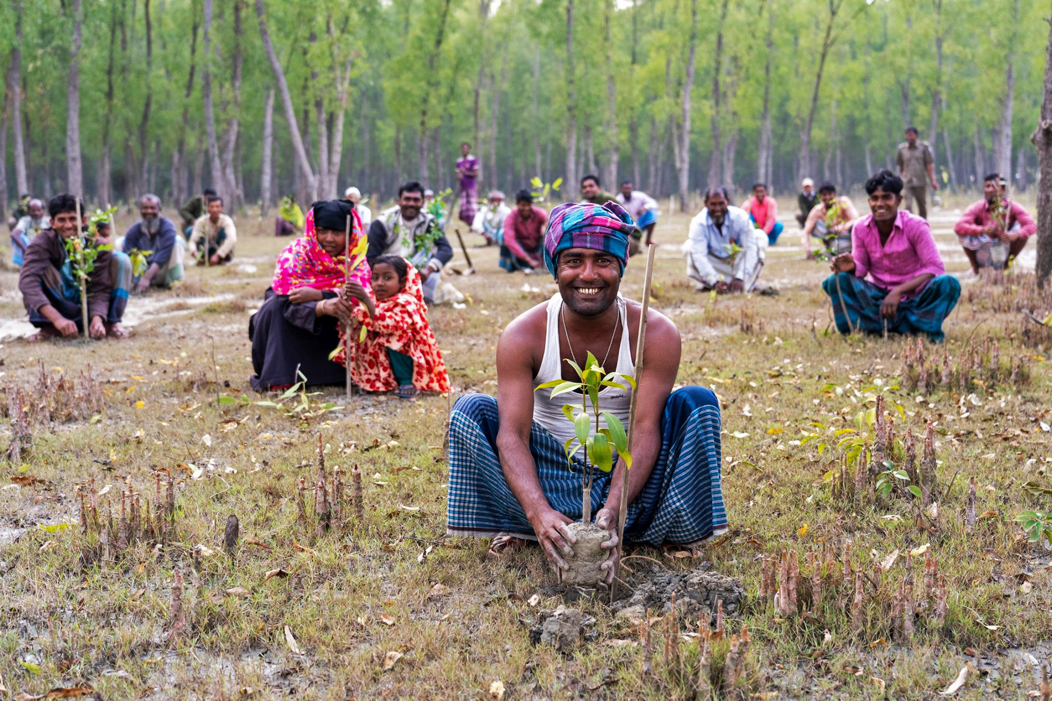 A local community takes part in a tree plantation project in 2018. Image by UNDP Bangladesh via Flickr (CC BY-NC 2.0)