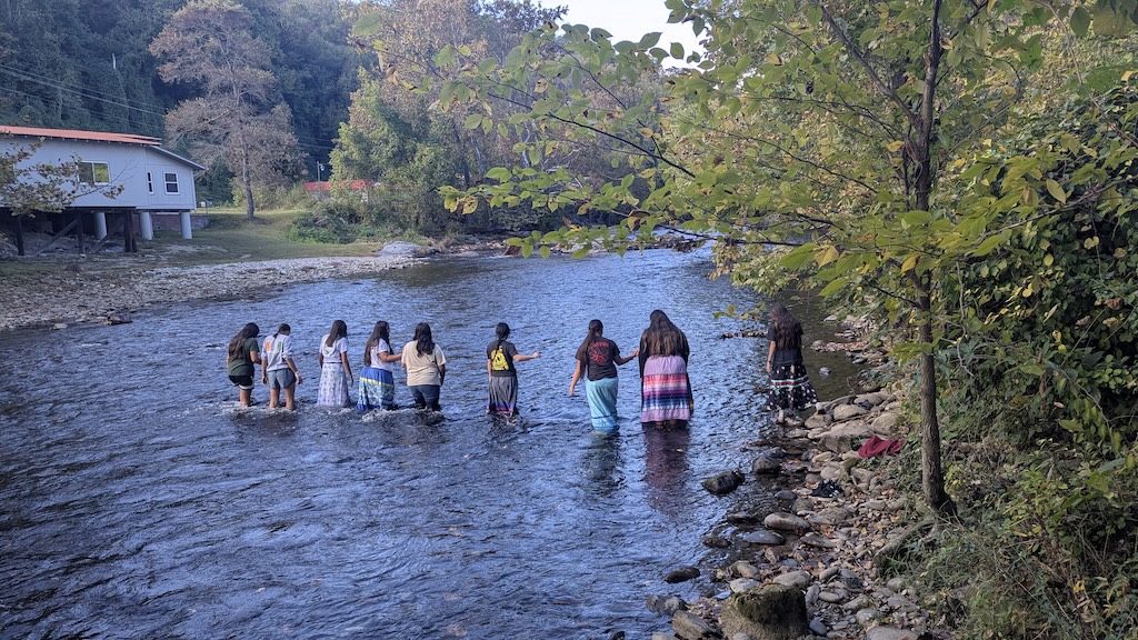 Eastern Band of Cherokee Indians NAIWA Daughters in the Oconaluftee River.