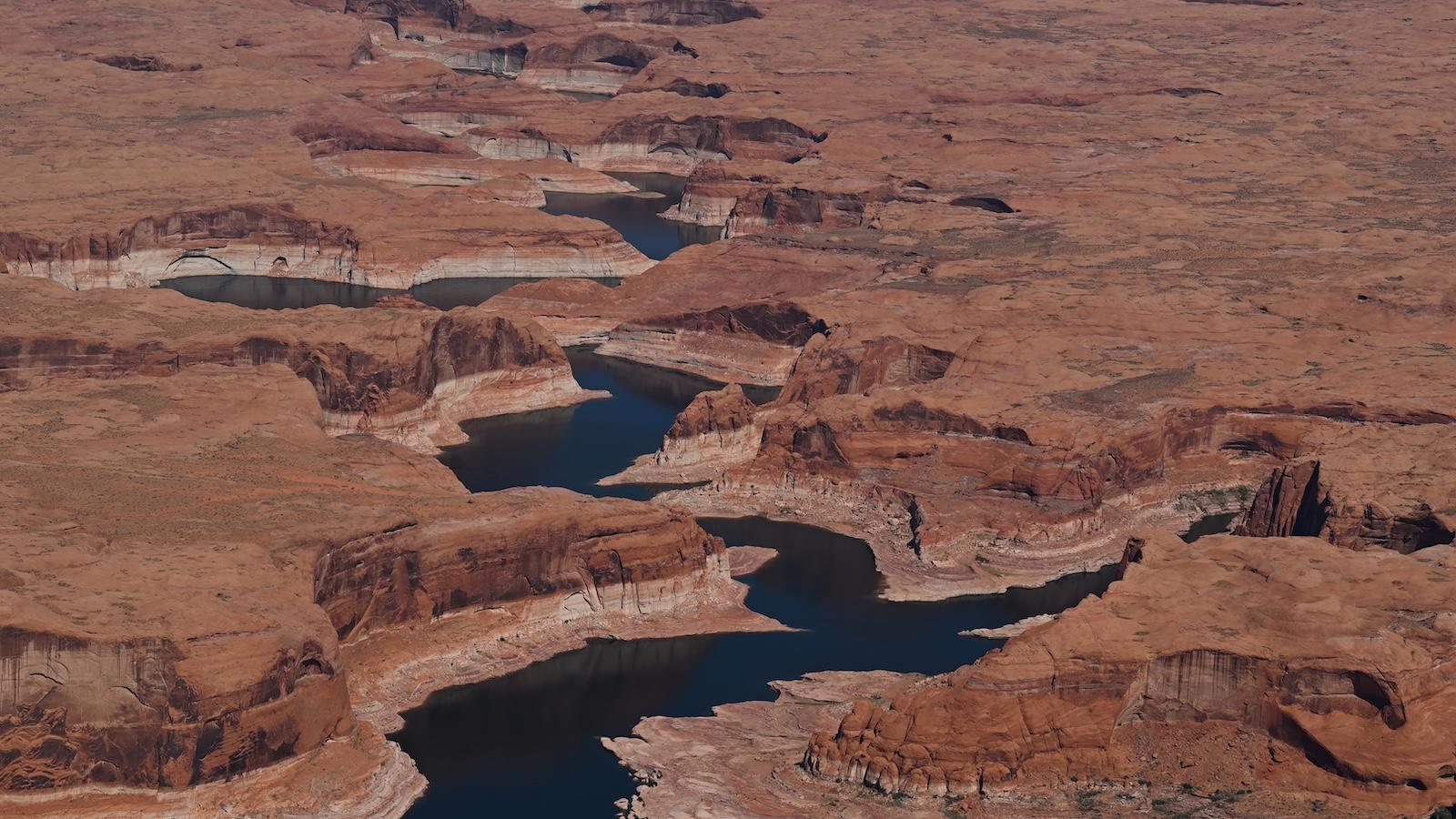 Lake Powell is shown surrounded by the rugged terrain of Utah.
