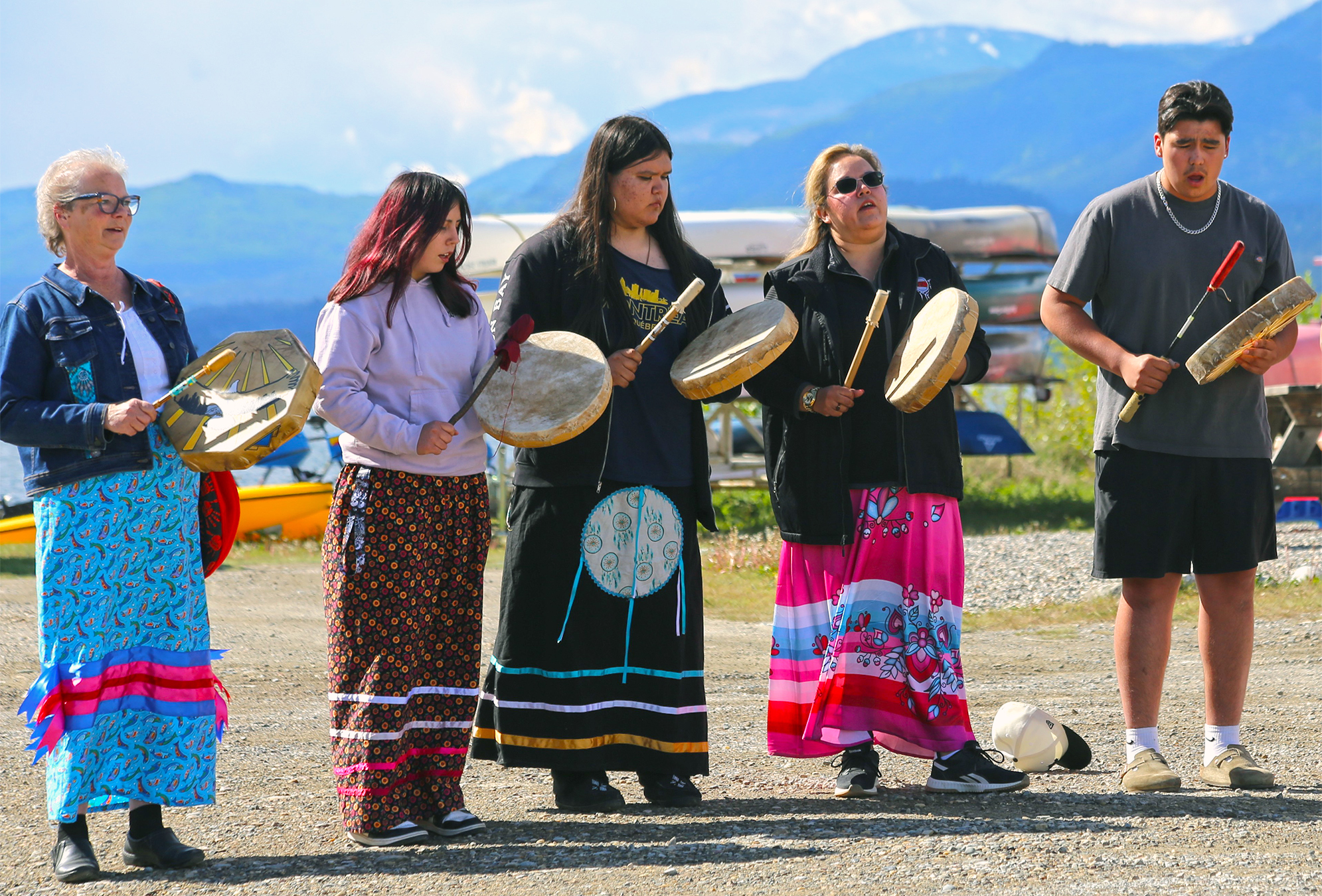 Shuswap Band drummers at a ceremonial fry release in Invermere, May 2026. The ceremonial fry releases and Fish-in-School educational releases on the Upper Columbia River connect salmon and salmon people, bringing together Indigenous and non-Indigenous community members working for salmon reintroduction. Image by Ruth Kamnitzer.